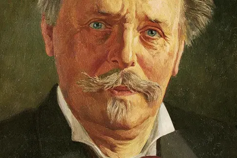 Buch-Cover mit einem Porträt-Gemälde des Schriftstellers Karl May (älterer Herr mit grau-meliertem Haar und Bärtchen), darunter stehen Buch- und Reihentitel