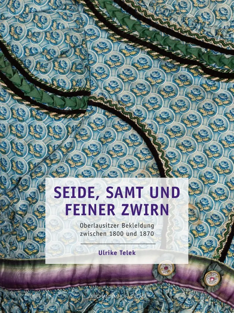 Buch-Cover mit Detailaufnahme eines historischen, gemusterten Seidenstoffs, darauf stehen Autorin und Titel des Buches